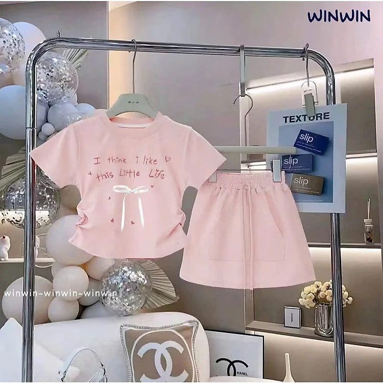 SET VÁY BÉ GÁI ÁO THUN DÂY RÚT ĐÍNH NƠ KÈM CHÂN VÁY CHỮ A TỪ 12-45KG DÀNH CHO BÉ GÁI