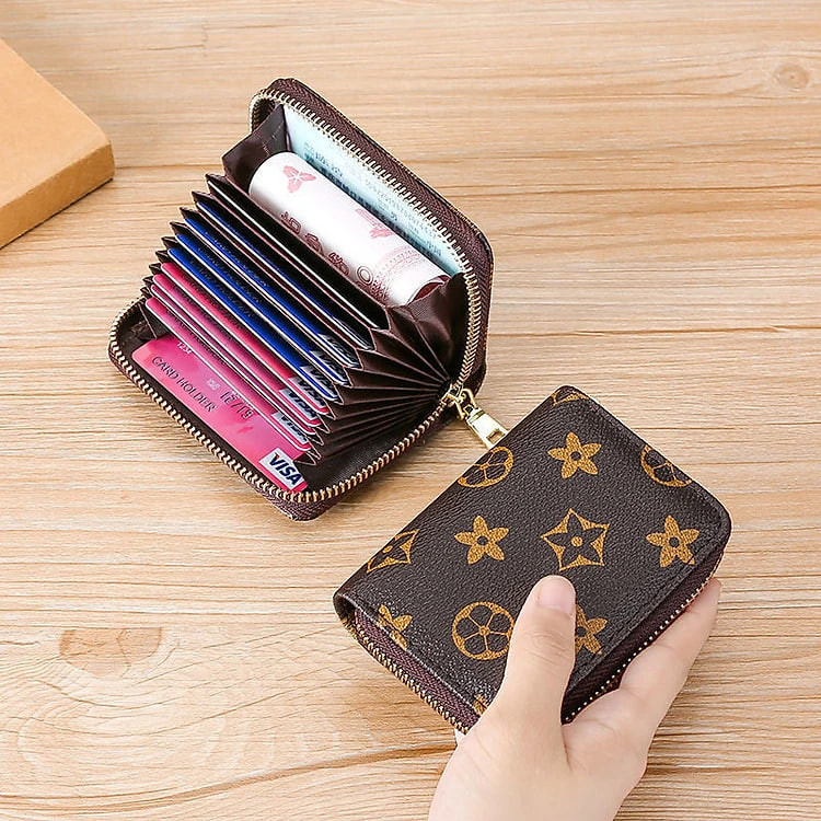 Ví  ngắn cầm tay  nữ nhiều  ngăn da PU cao cấp, chất da mềm mịn .dùng đựng thẻ , giấy tờ xe , đựng tiền nhỏ gọn và tiện lợi ,phong cách nữ tính, trẻ trung , hiện đại